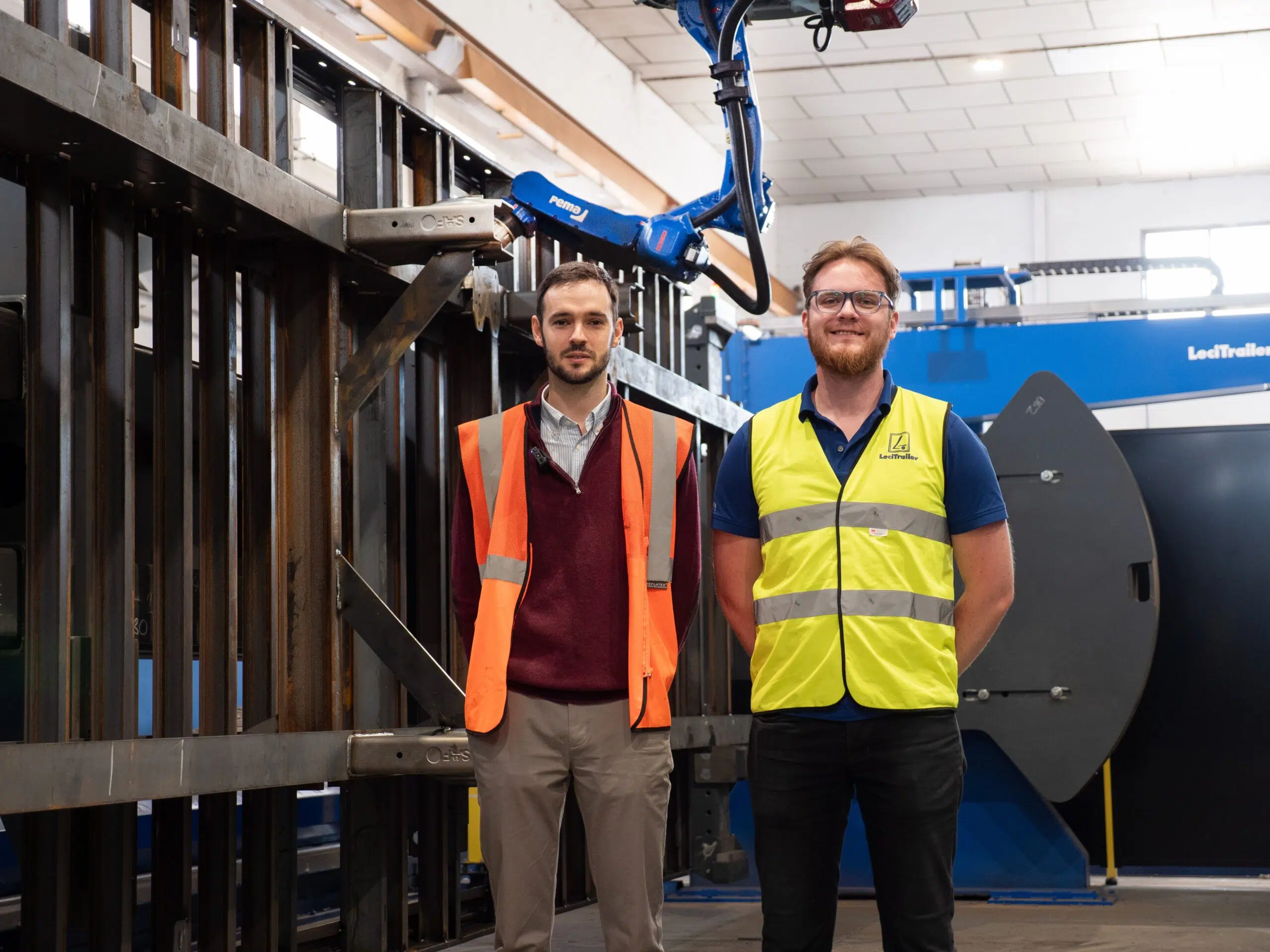 Lecitrailer automates trailer manufacturing with PEMA solutions, Juanjo Martin and Patrik in front of the station