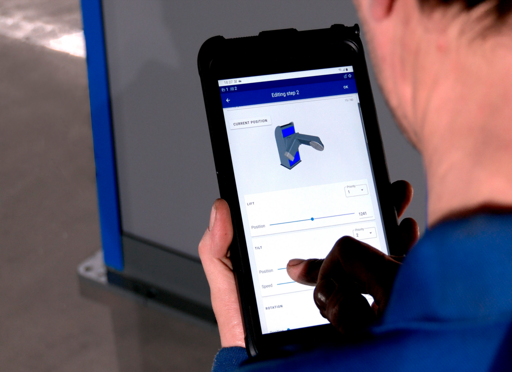 A close-up of a welding positioner’s control panel, showing various settings for tilt, rotation, and speed control.